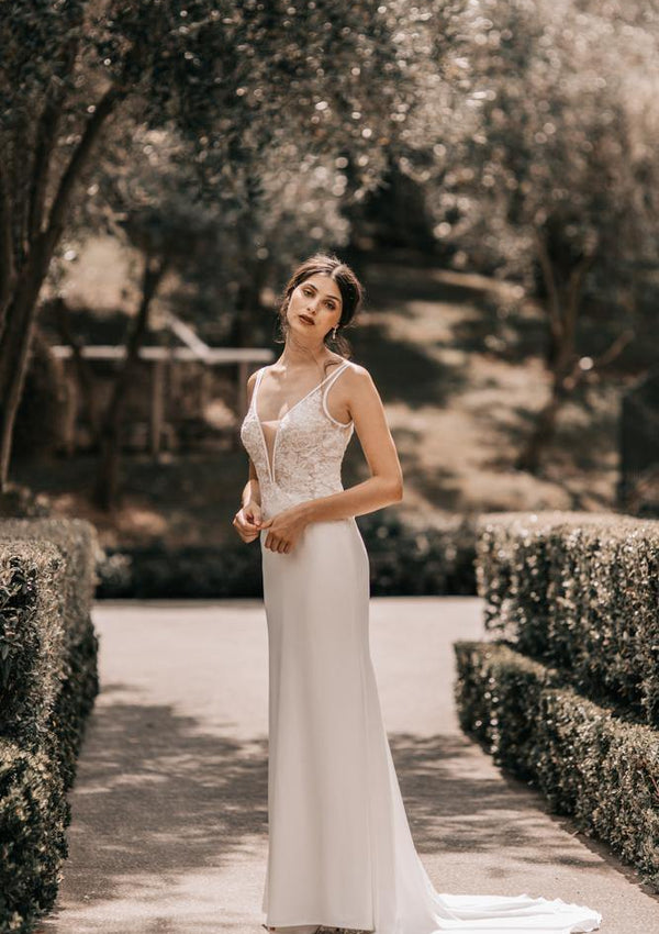 ChiqWawa Bridal Couture - Sheath- A sheath wedding dress skims the body and  falls straight to the floor below the hips. This wedding dress silhouette  is perfect for brides who want an