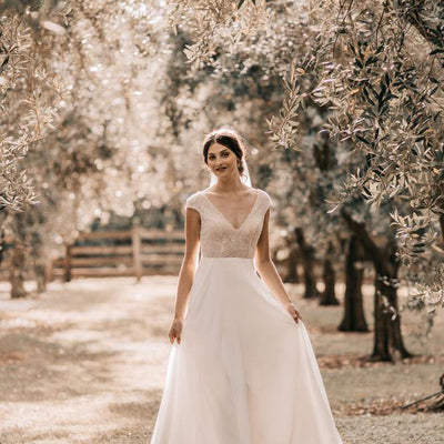 Model wearing Larose wedding gown
