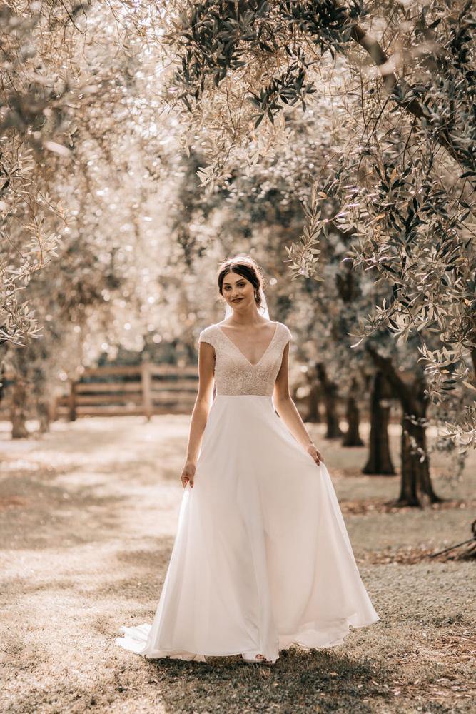 Model wearing Larose wedding gown