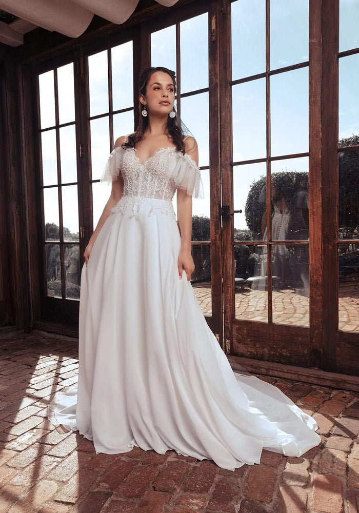 Model wearing Maci wedding gown
