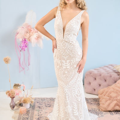 Model wearing fit-n-flare Star wedding dress with bohemian inspired lace from the Mademoiselle collection
