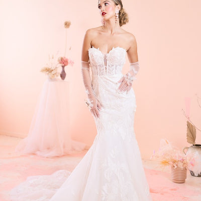 Model wears Stella wedding dress with sweetheart neckline from the Mademoiselle collection