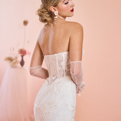 Model wears Stella wedding dress with sweetheart neckline from the Mademoiselle collection