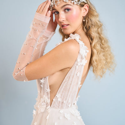 Model wearing A-line Sofia wedding dress with 3D florals from the Mademoiselle collection