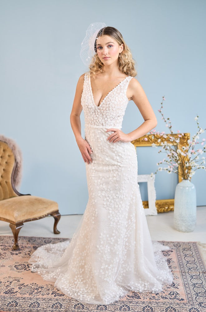 Model wear fit-n-flare Sumiko wedding dress from the Mademoiselle collection