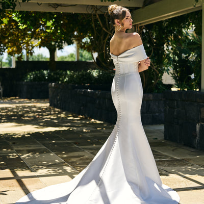 Back view of paden gown, off-the-shoulder, fit-n-flare, mikado fabric, full length train, designer gown from Miss chloe bridal