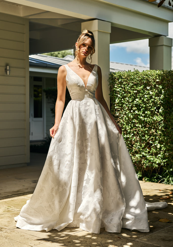 Plunging Sequin and Beaded A-Line Gown | David's Bridal